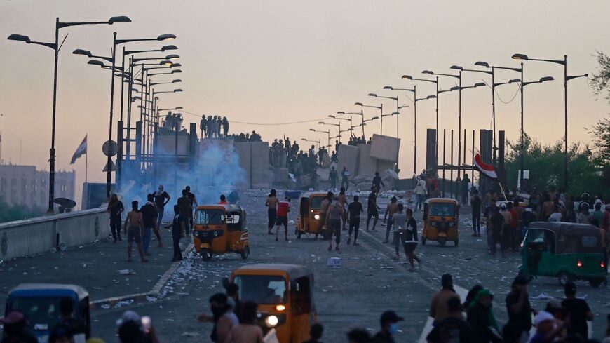 Clashes rock Baghdad's Green Zone as Iraqi parliament re-elects speaker
