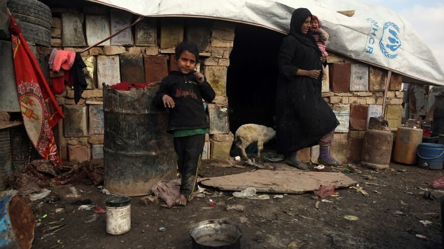 How can Iraq help 3.5 million citizens living in urban slums?